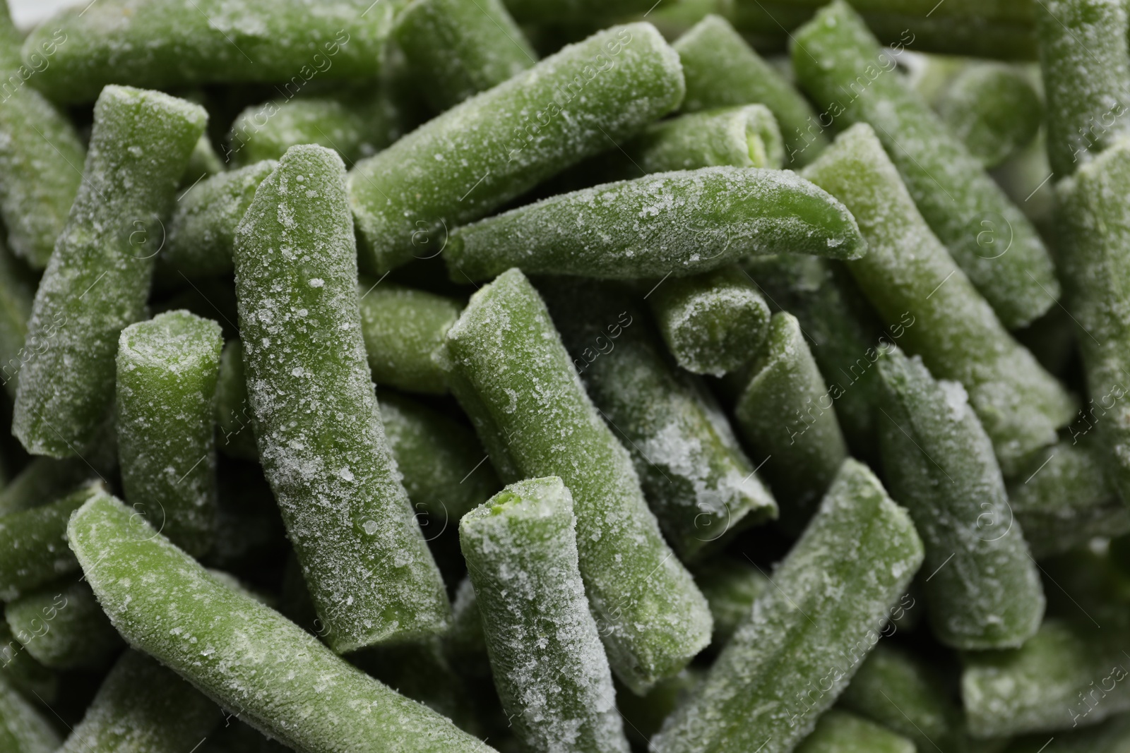 Photo of Frozen green beans as background, closeup view