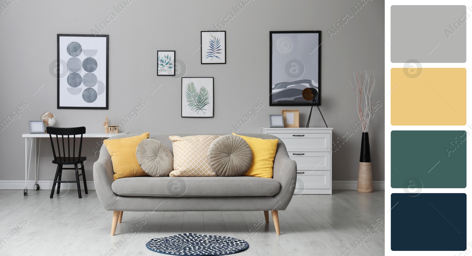 Image of Stylish living room with comfortable sofa near grey wall. Interior design and matching color palette