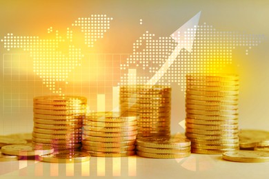 Image of Currency trading. Stacked coins, graphs and world map, toned in yellow