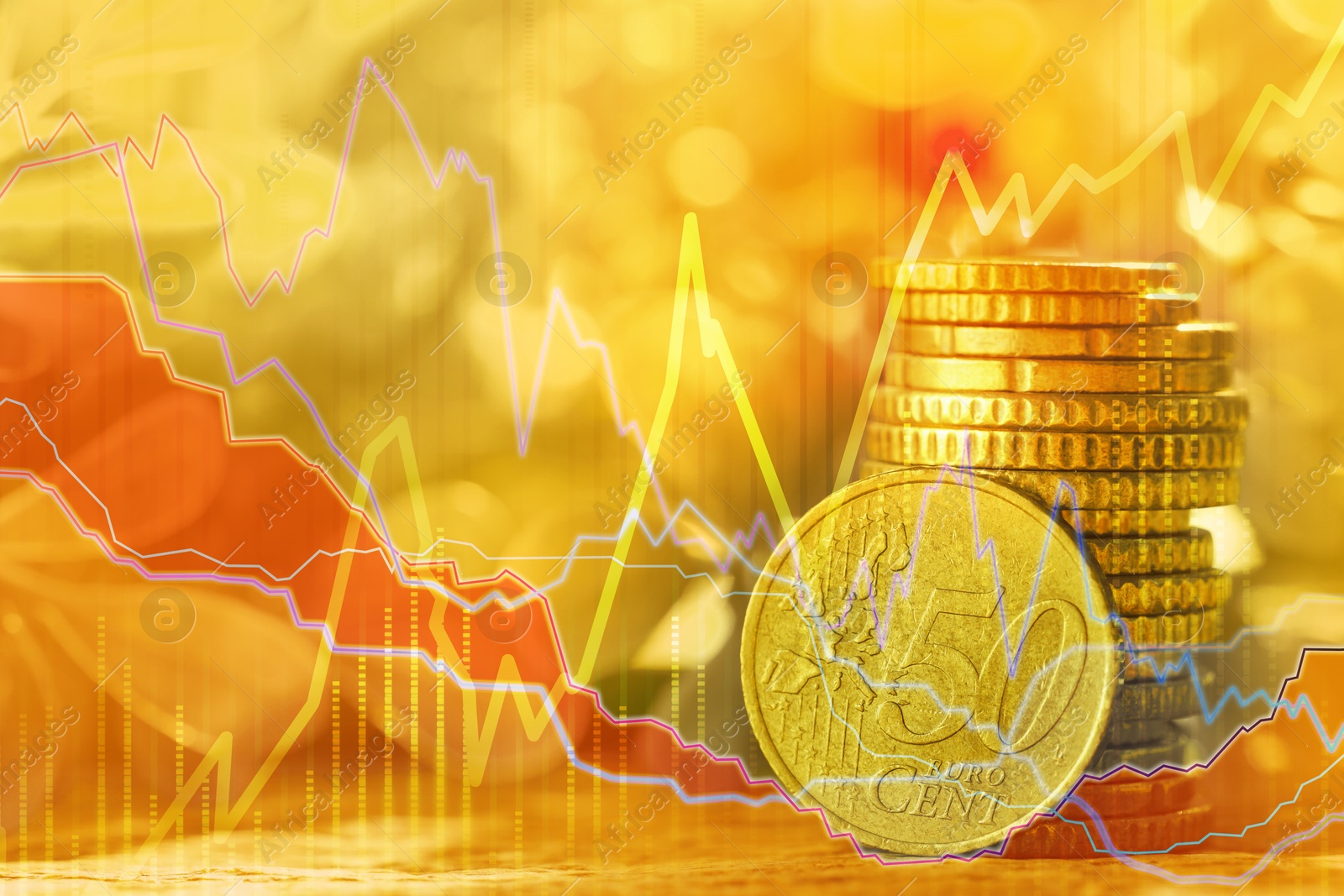 Image of Currency trading. Stacked euro cent coins and graphs, toned in yellow