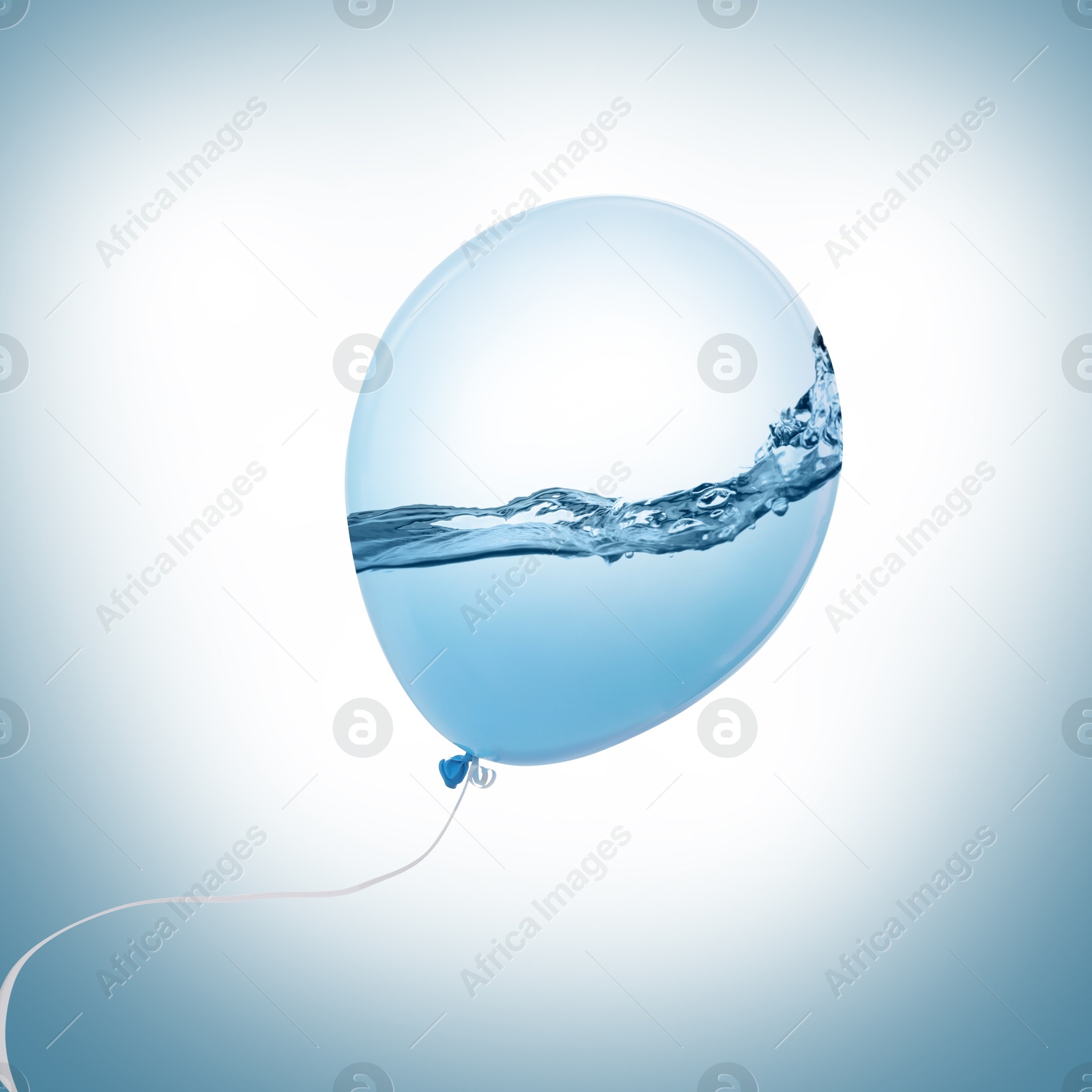 Image of Balloon with water inside on light blue background