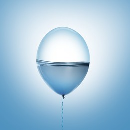 Image of Balloon with water inside on light blue background