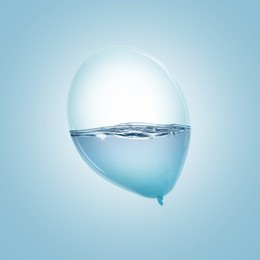 Image of Balloon with water inside on light blue background