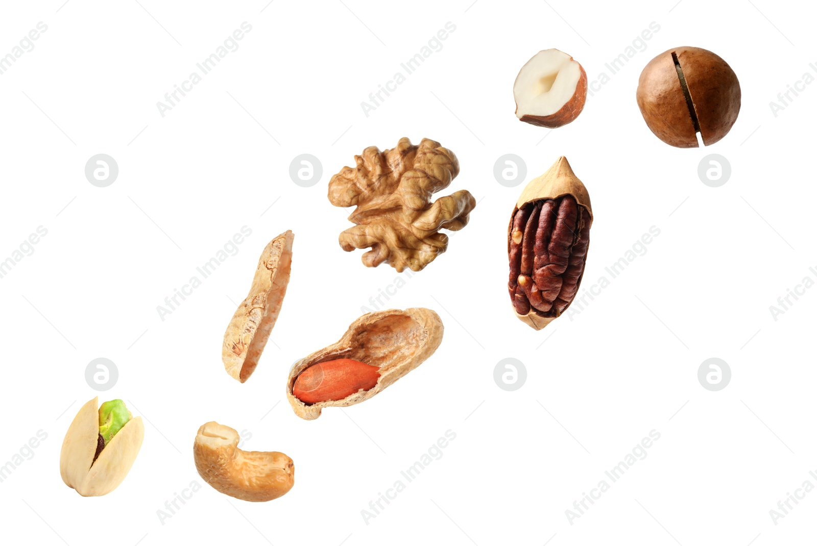 Image of Macadamia and other nuts in air on white background