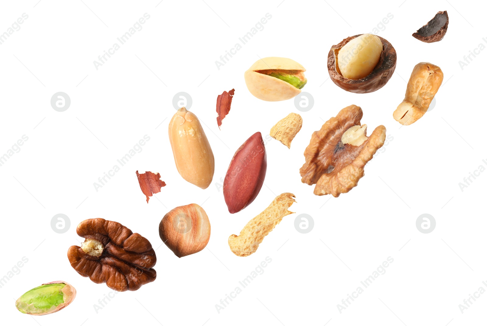 Image of Macadamia and other nuts in air on white background