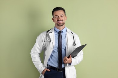 Smiling doctor with stethoscope and clipboard on olive background