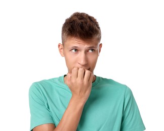 Portrait of scared young man on white background