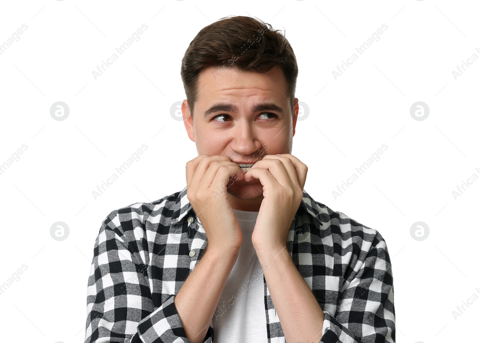 Photo of Portrait of scared young man on white background