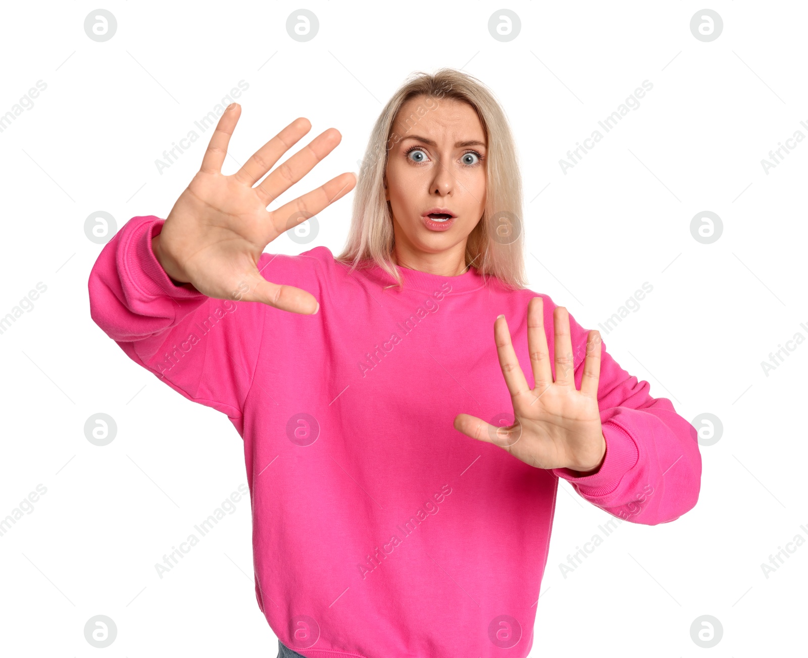 Photo of Portrait of scared woman on white background