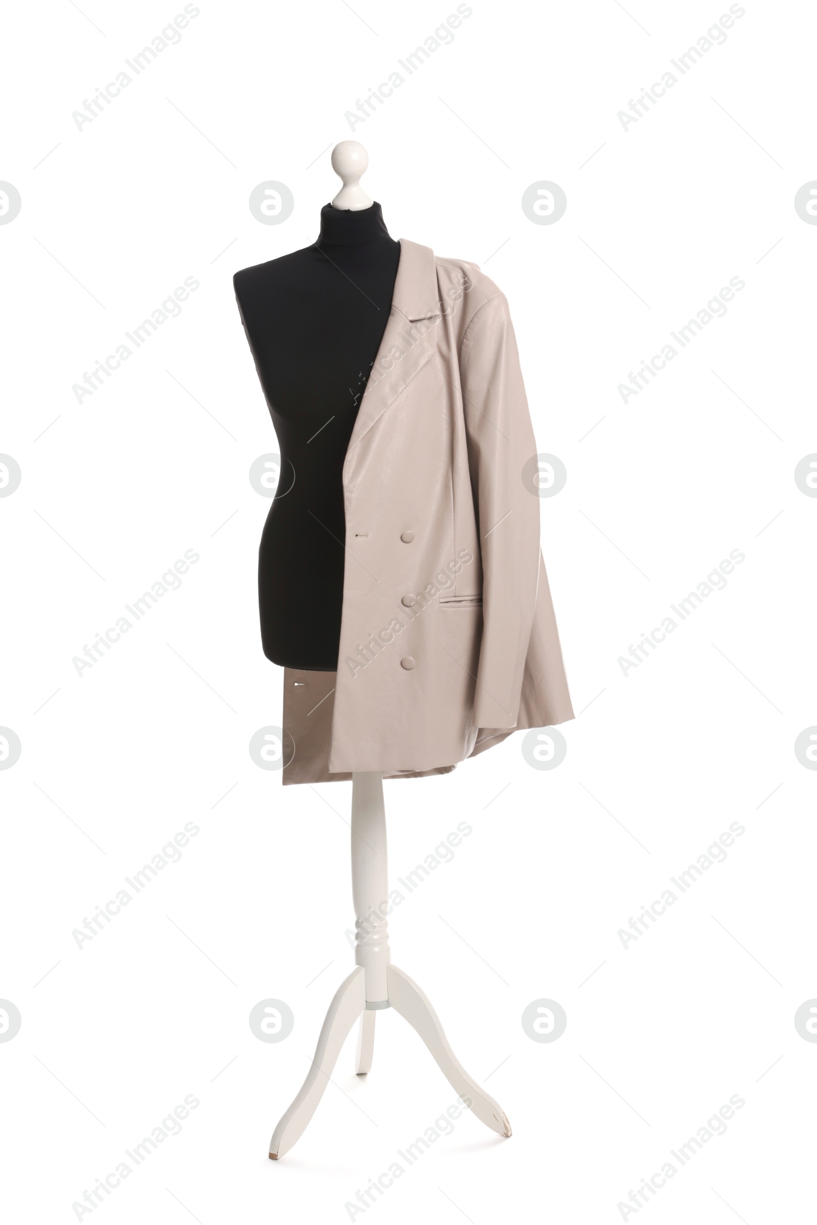 Photo of Female mannequin with beige jacket isolated on white