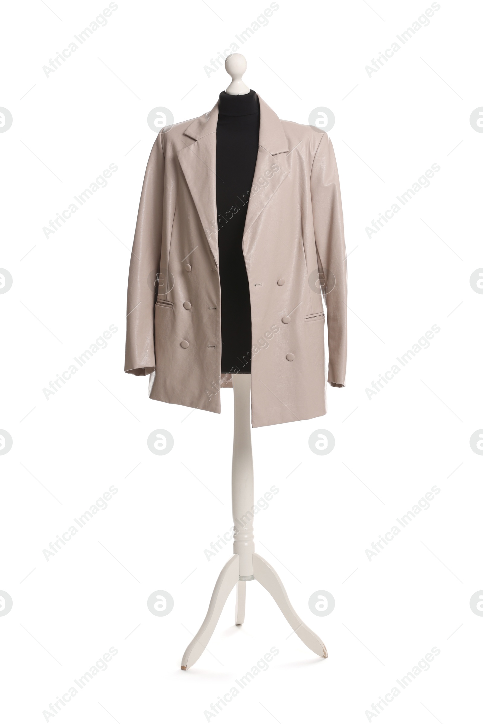 Photo of Female mannequin with beige jacket isolated on white