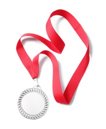 Photo of One silver medal isolated on white, top view