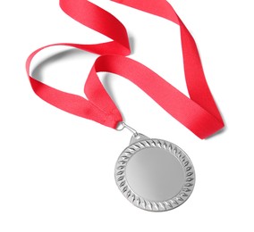 Photo of One silver medal isolated on white, above view