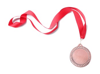 Photo of One bronze medal isolated on white, top view