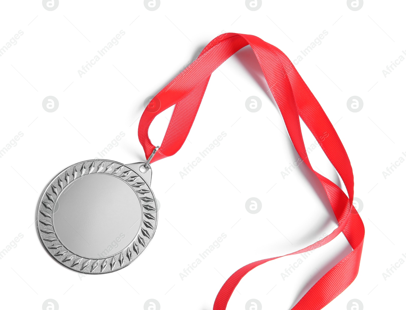 Photo of One silver medal isolated on white, top view