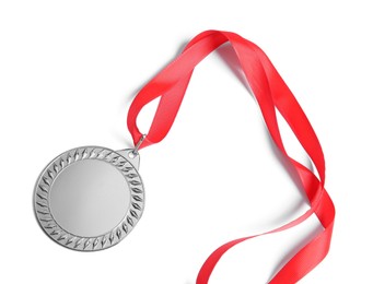 Photo of One silver medal isolated on white, top view