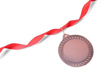 Photo of One bronze medal on white background, above view