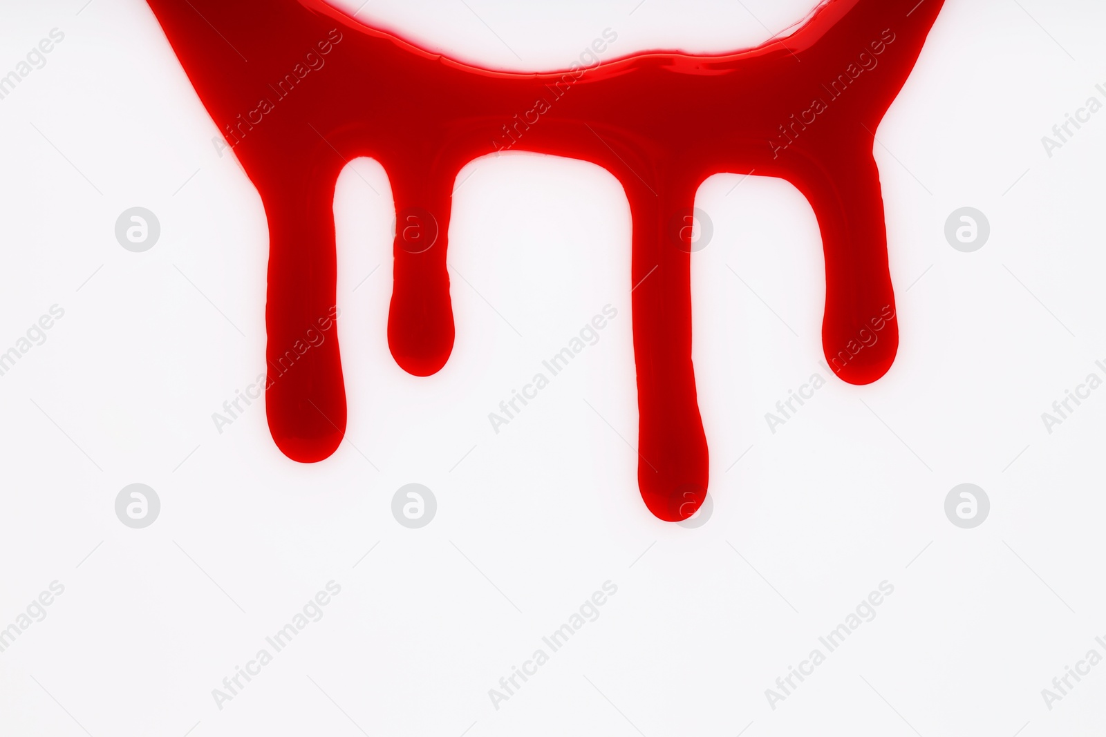 Photo of Stain of blood on white background, top view