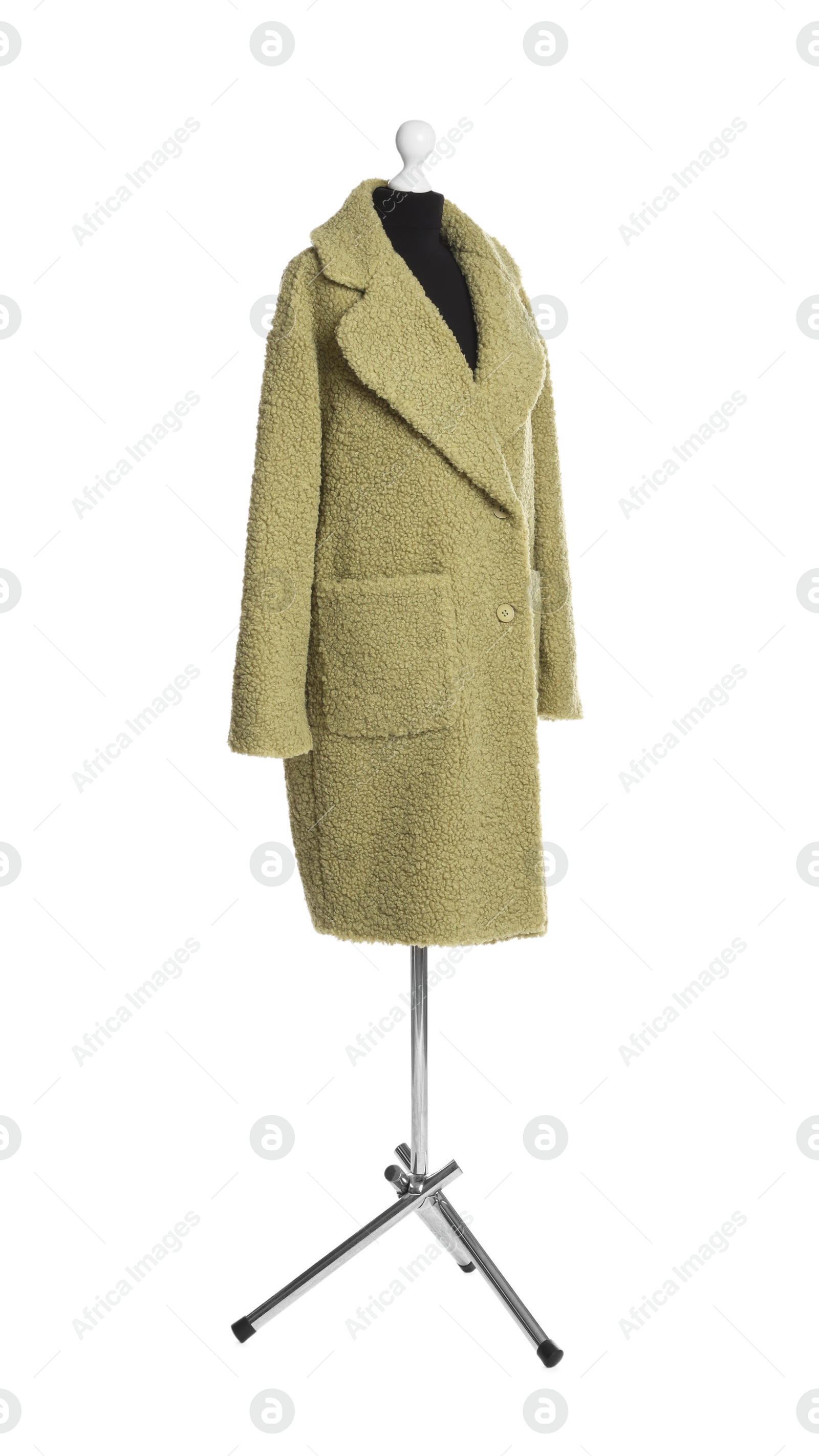 Photo of Female mannequin with stylish green coat isolated on white