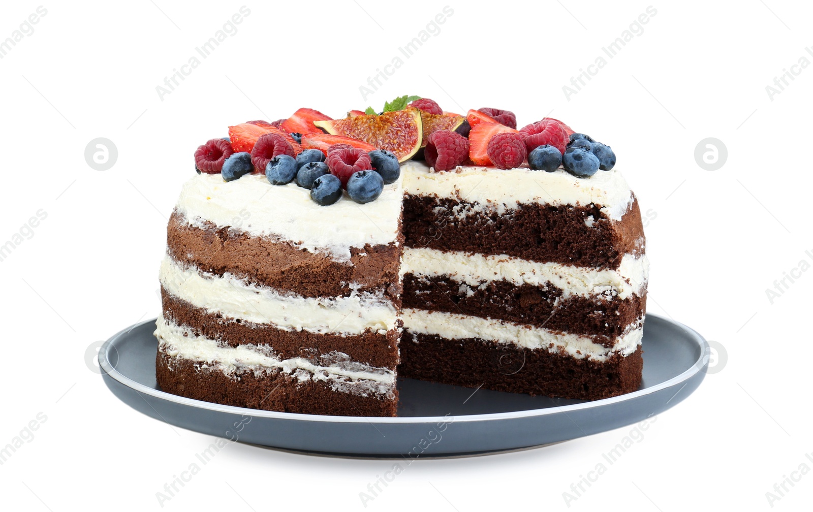 Photo of Cut delicious chocolate sponge cake with berries isolated on white