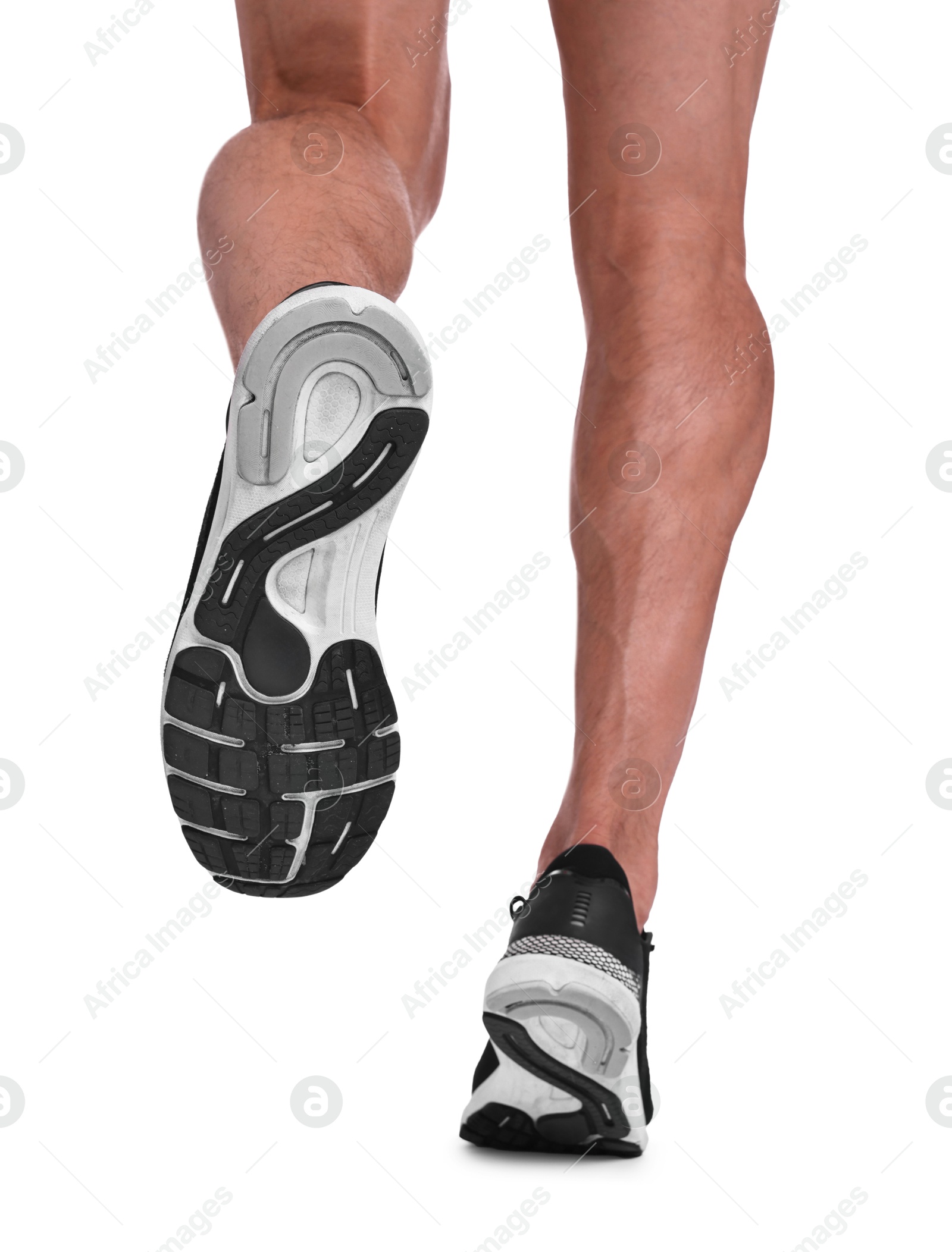 Photo of Man running on white background, closeup view