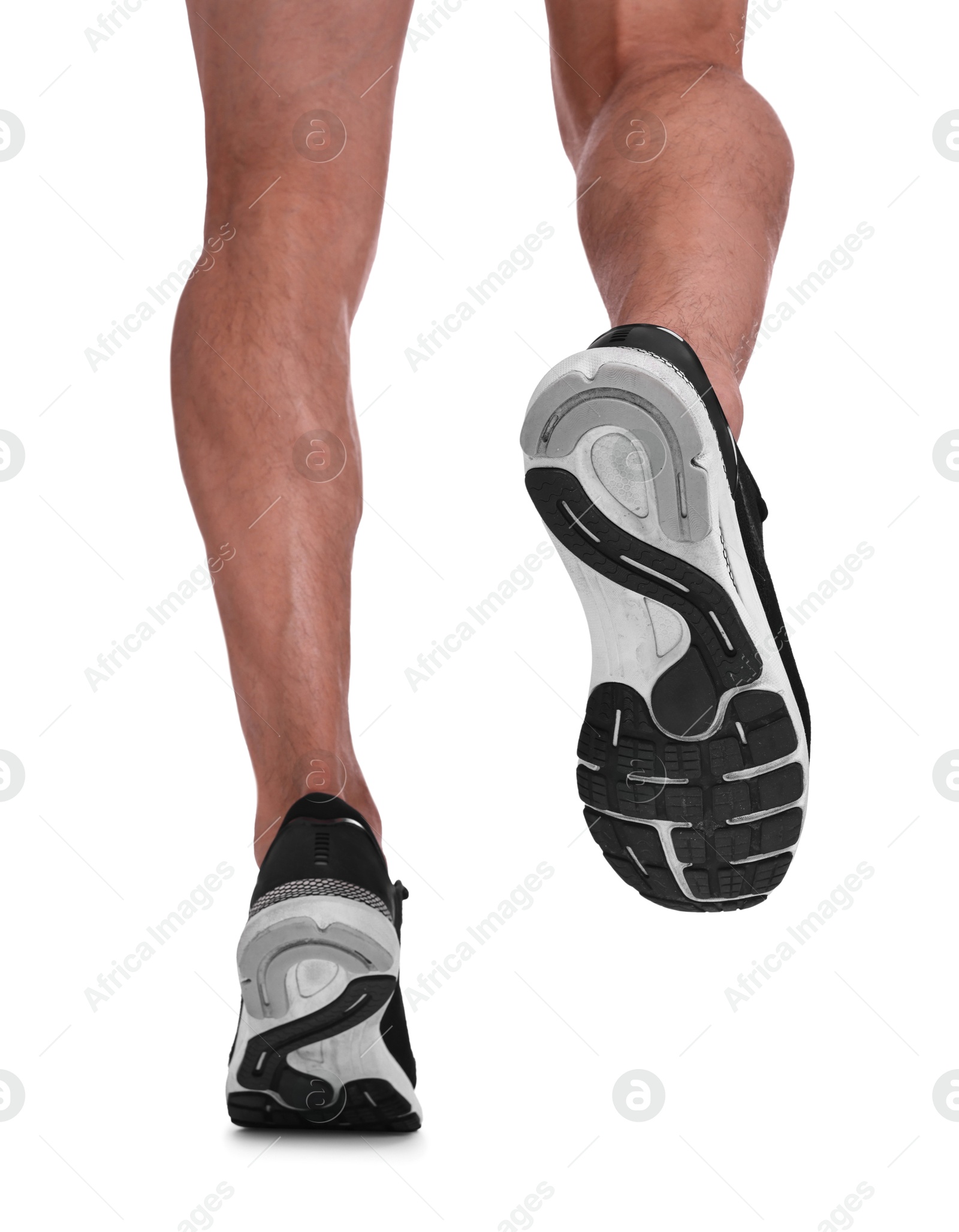 Photo of Man running on white background, closeup view