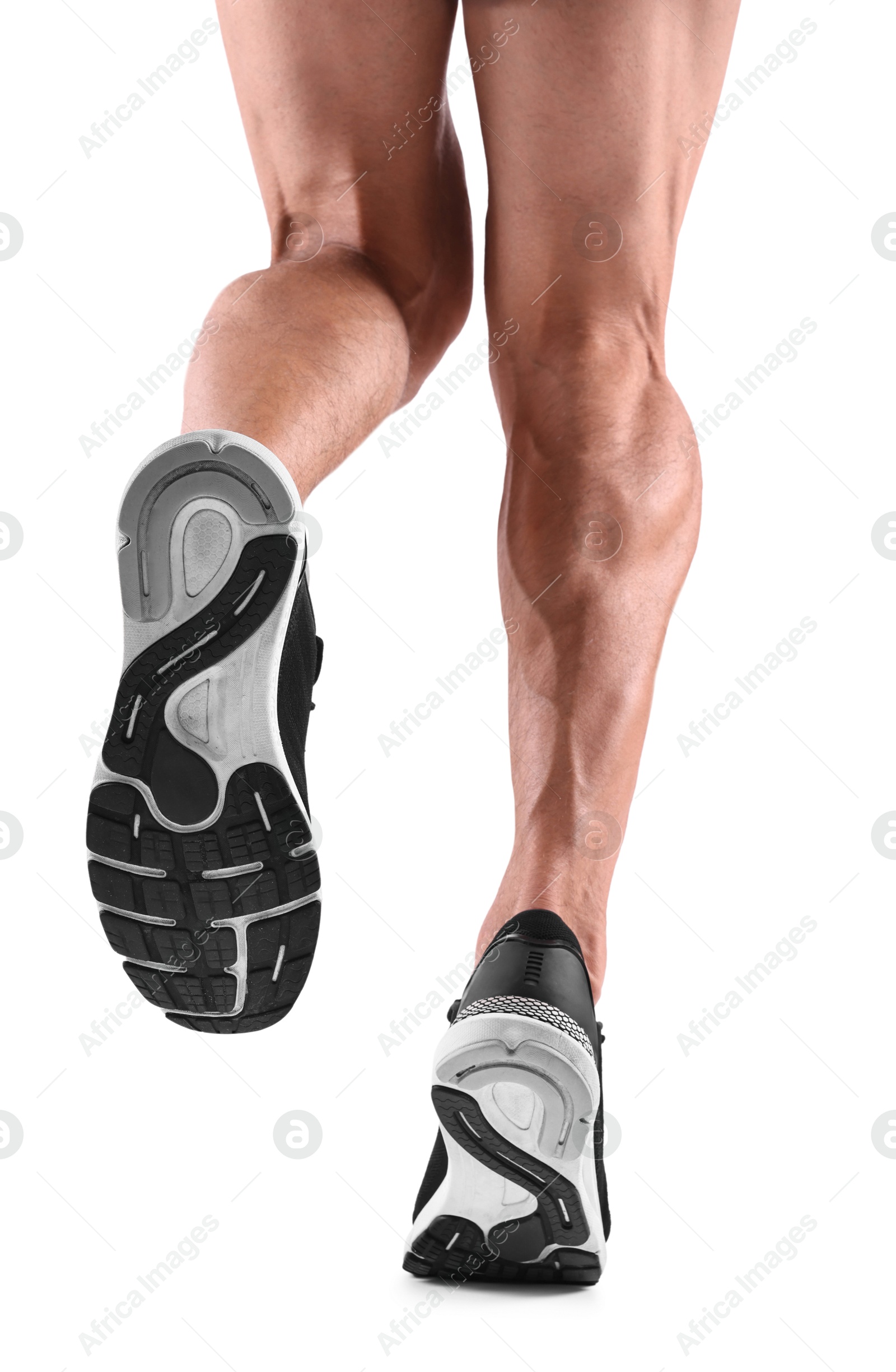 Photo of Man running on white background, closeup view