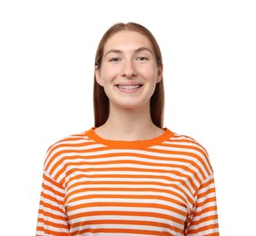 Smiling girl with braces on white background