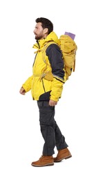 Man with backpack on white background. Active tourism