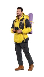 Happy man with backpack and binoculars on white background. Active tourism