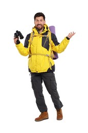 Photo of Happy man with backpack and binoculars on white background. Active tourism