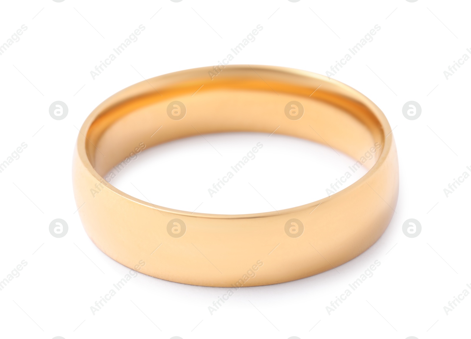 Photo of Beautiful golden wedding ring isolated on white