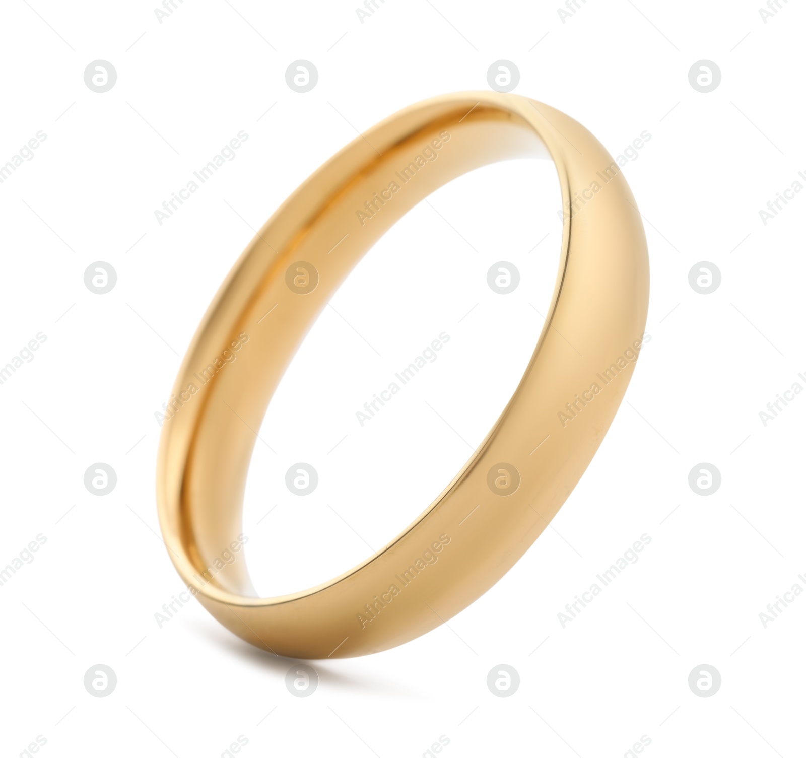 Photo of Beautiful golden wedding ring isolated on white