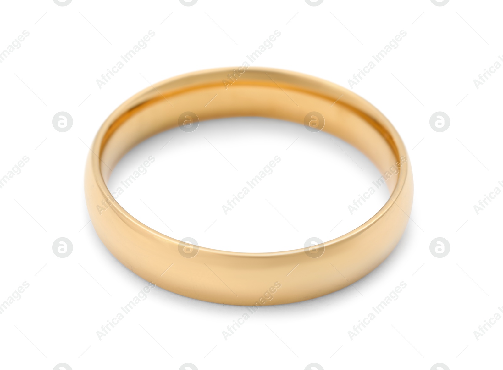 Photo of Beautiful golden wedding ring isolated on white