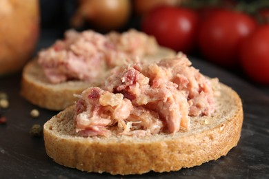 Photo of Sandwiches with canned meat on table, closeup