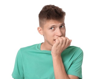 Portrait of scared young man on white background