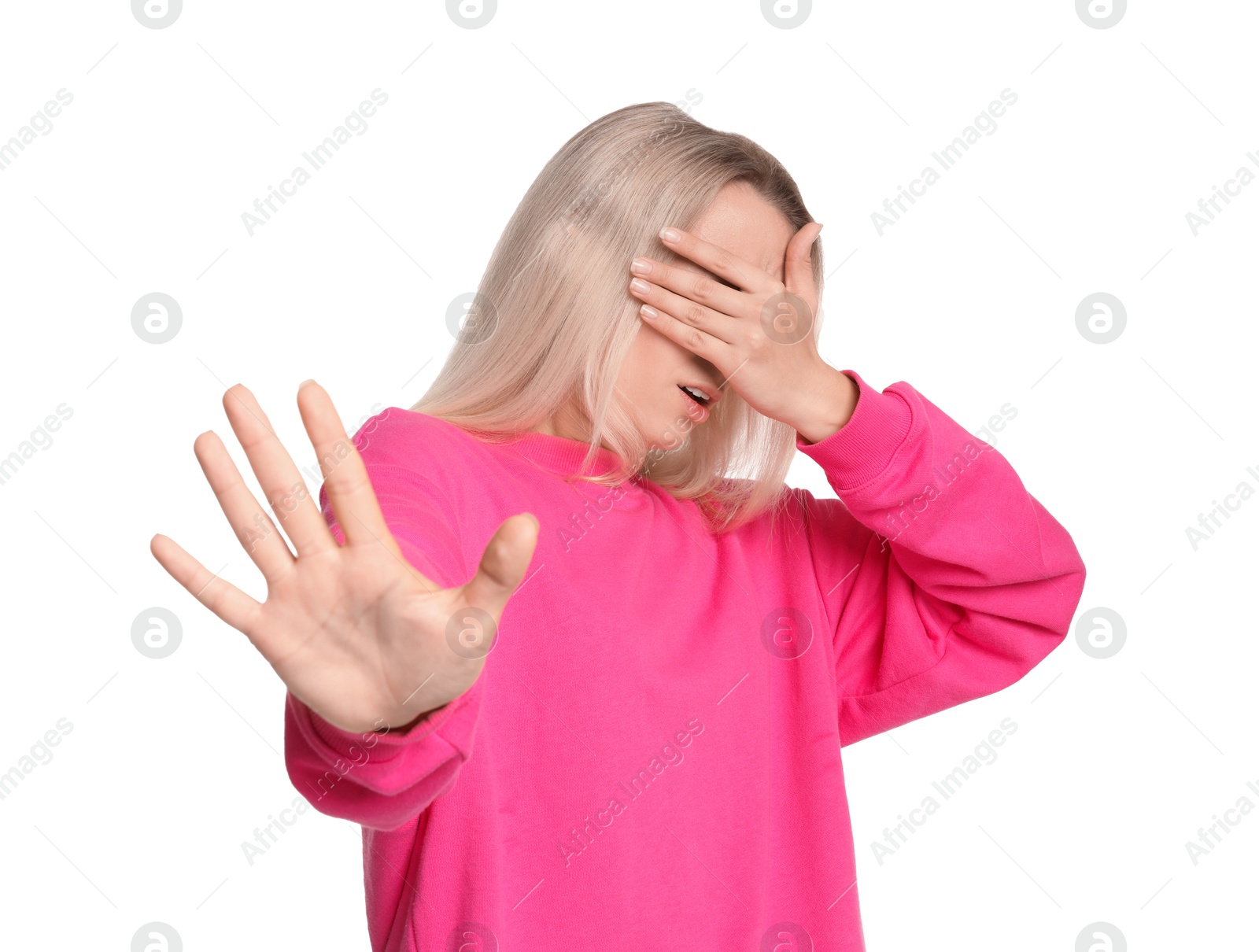 Photo of Portrait of scared woman on white background