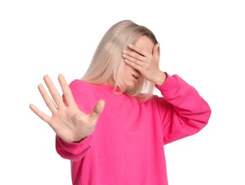 Photo of Portrait of scared woman on white background