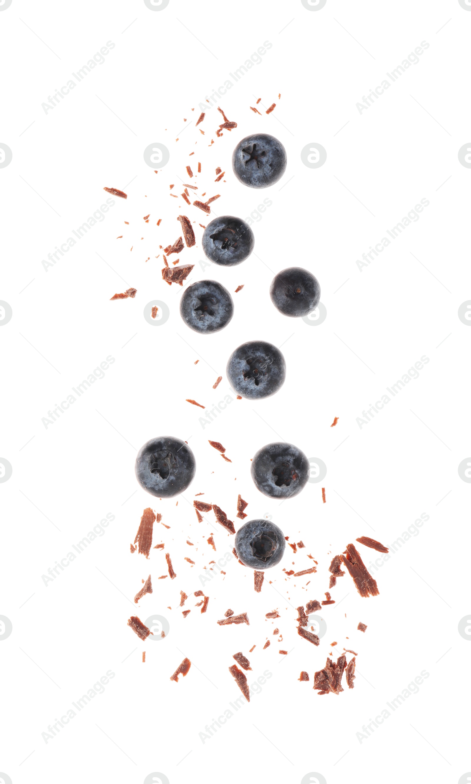 Photo of Fresh blueberries and crushed chocolate pieces isolated on white