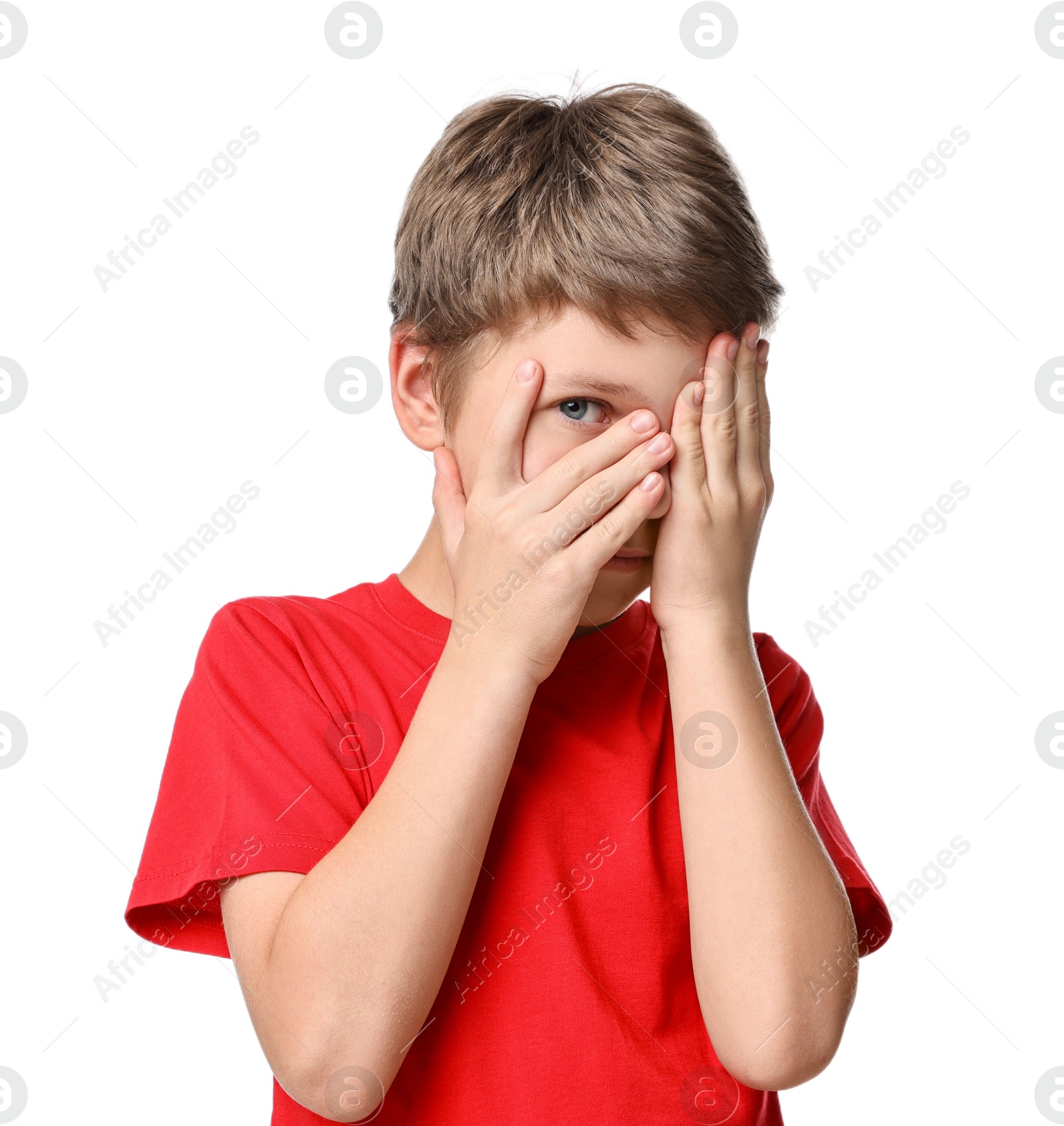 Photo of Portrait of scared little boy on white background