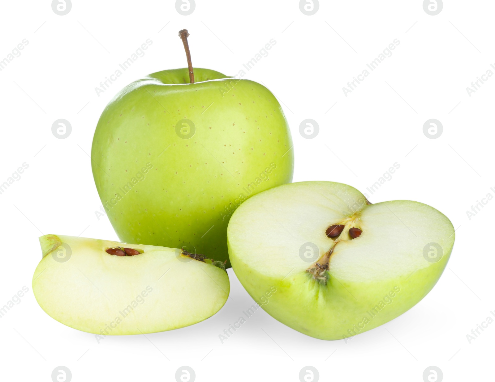 Photo of Whole and cut fresh green apples isolated on white