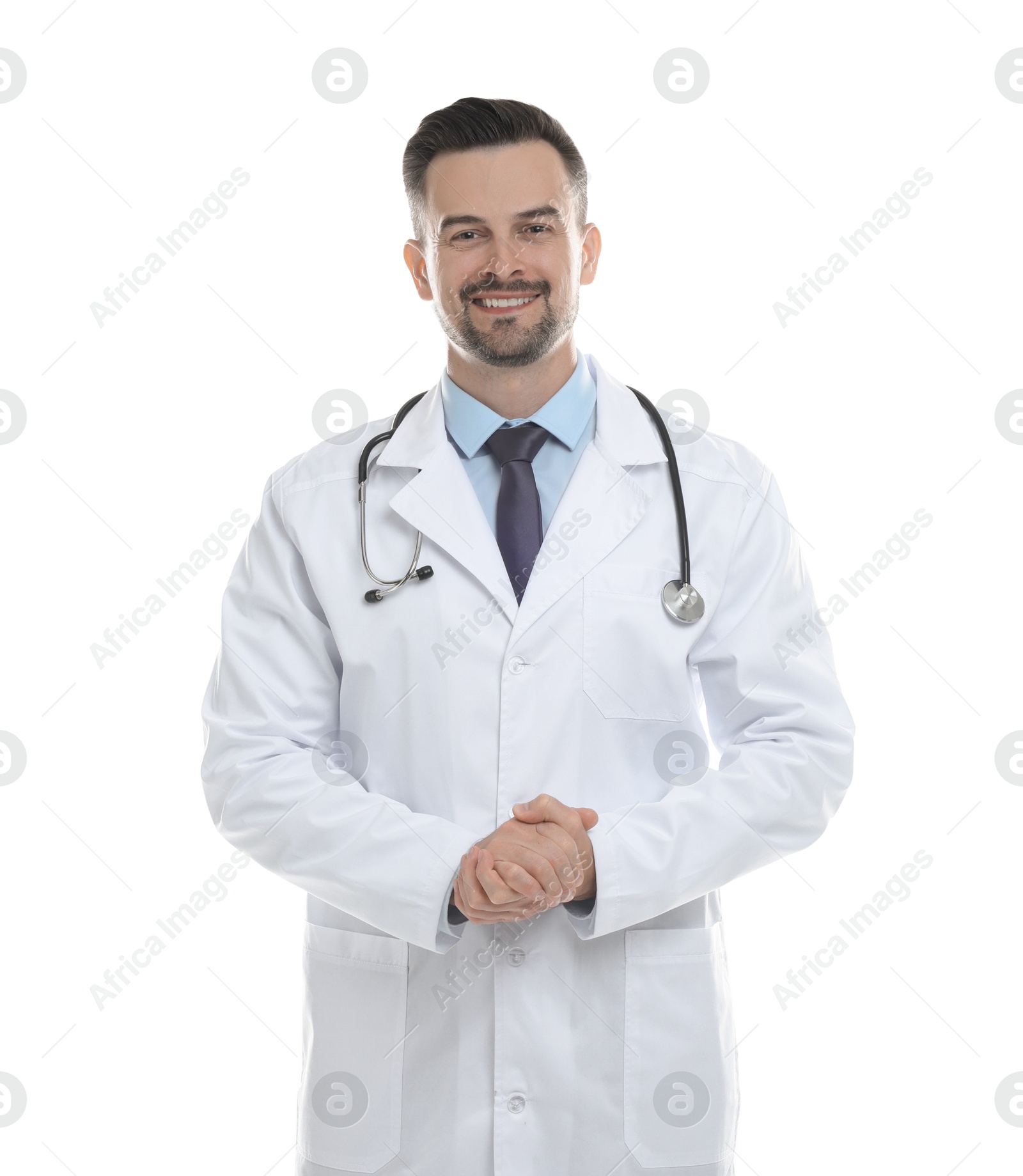 Photo of Smiling doctor with stethoscope isolated on white