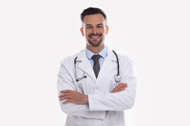 Photo of Smiling doctor with stethoscope on white background