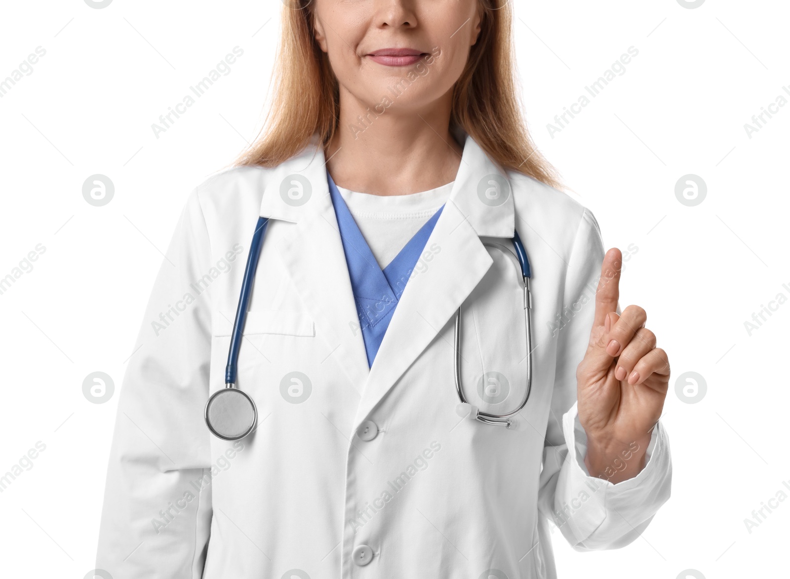 Photo of Doctor with stethoscope pointing at something on white background, closeup