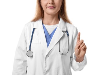 Photo of Doctor with stethoscope pointing at something on white background, closeup