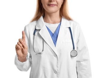 Doctor with stethoscope pointing at something on white background, closeup