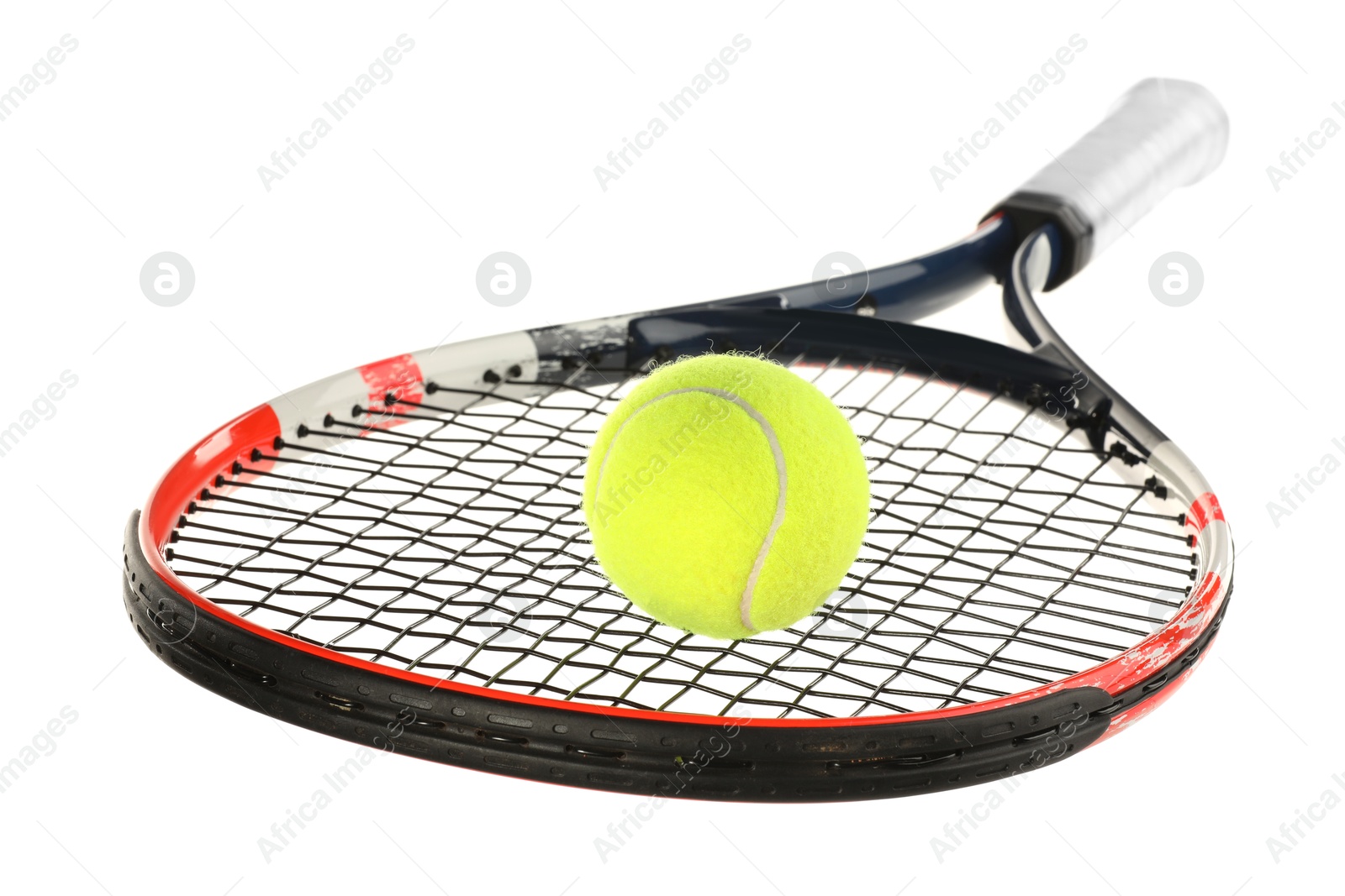 Photo of Tennis racket with ball isolated on white