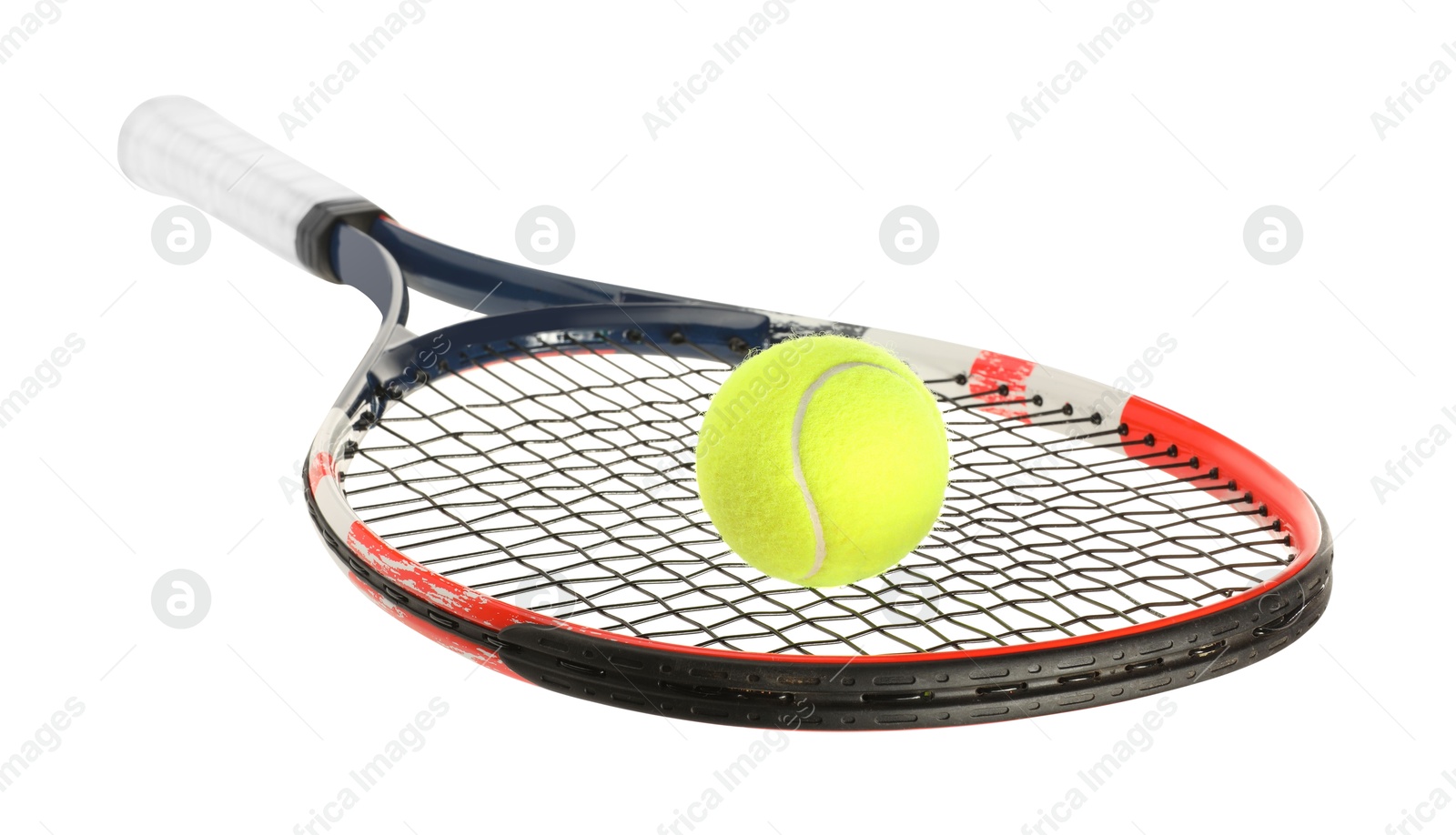 Photo of Tennis racket with ball isolated on white