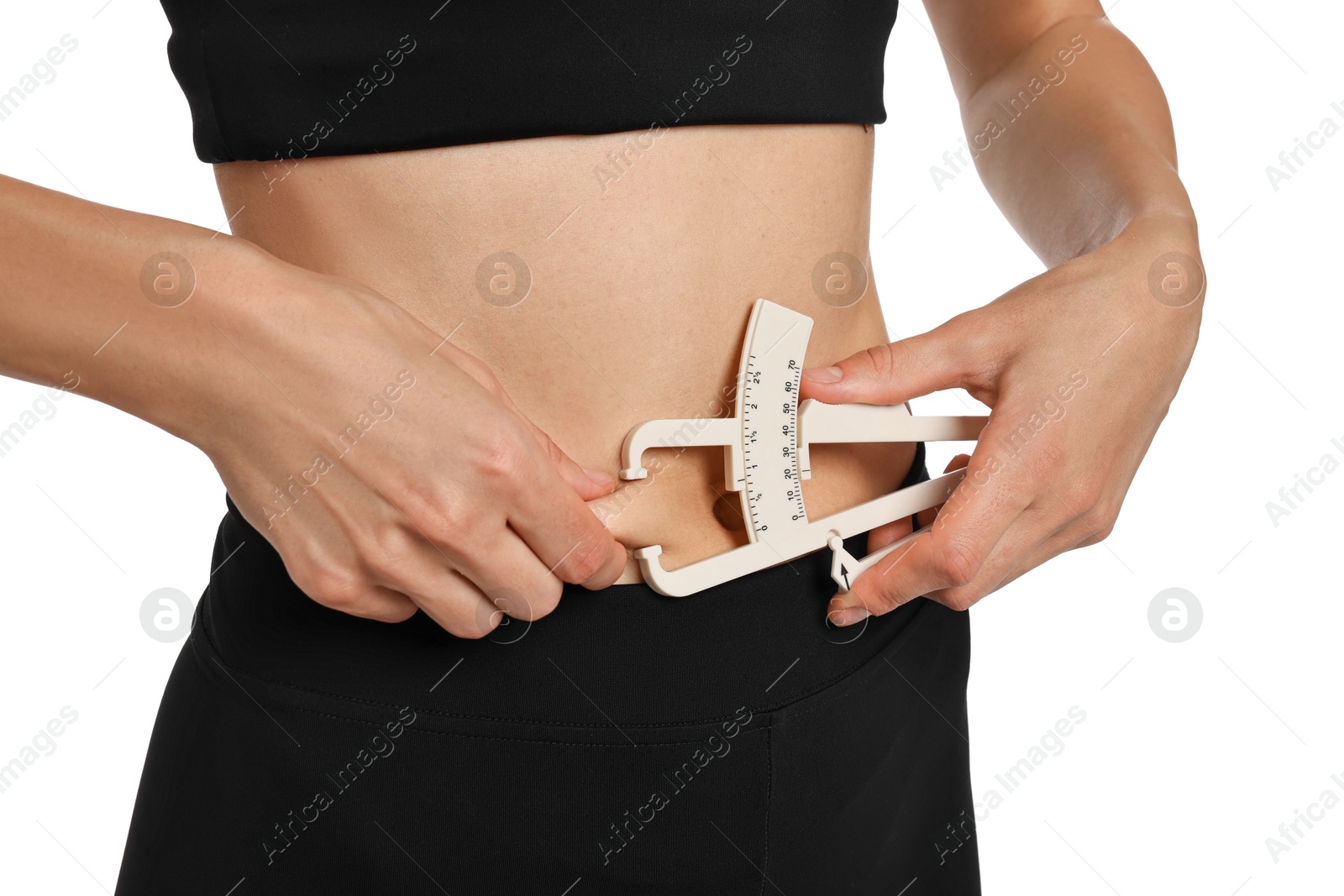 Photo of Woman measuring body fat with caliper on white background, closeup