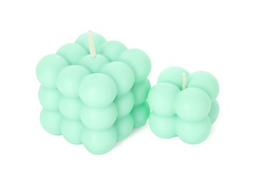 Photo of Beautiful turquoise bubble candles isolated on white